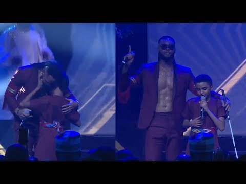 Flavour Brings 12 Year-Old Blind Boy On Stage Performs 'Most High' Together