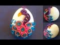 Paper Quilling Easter Eggs decorated with quilled peacock