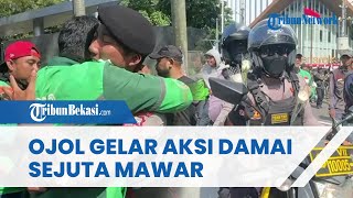 Ribuan Ojol Gelar Aksi Damai Sejuta Mawar di Kawasan Monas, Isyaratkan Tak Ada Lagi Anarkisme