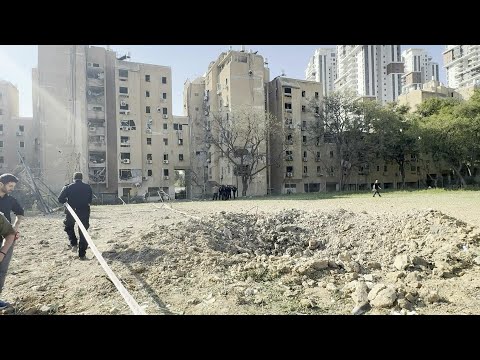 Video Thumbnail: Security forces deploy at impact site after Iranian missile strike in southern Israel | AFP
