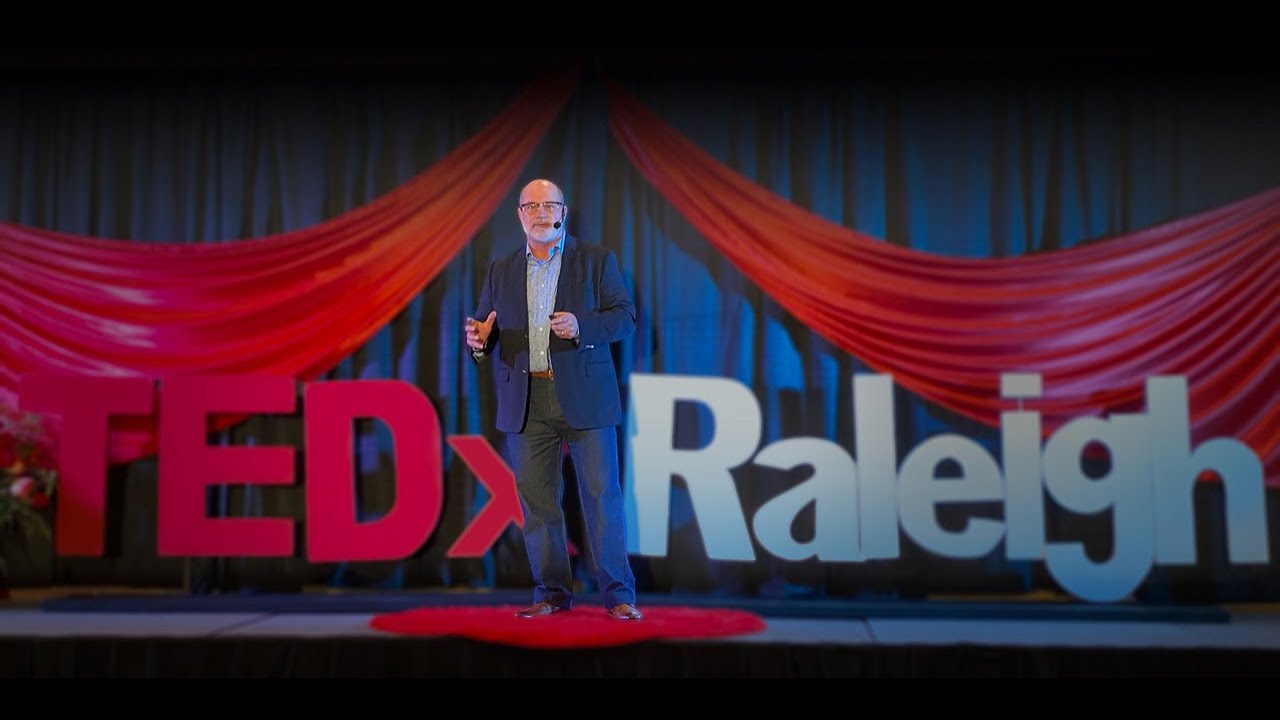 Dr. Patrick Porter on stage