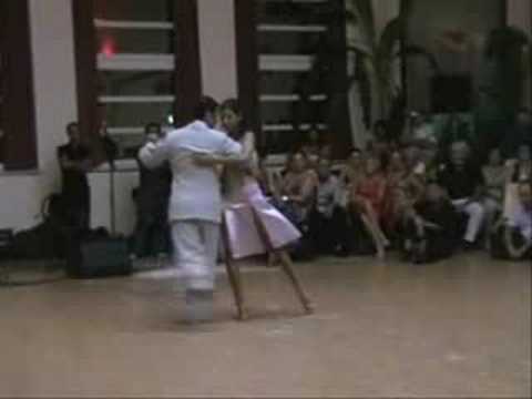  Roxana Suarez  and  Sebastian Achaval  are  dancing  to  the  milonga  "  Milonga Sentimental  "