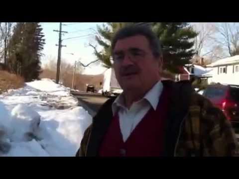 Rocco Leo talks about 8-foot mound of snow on his property