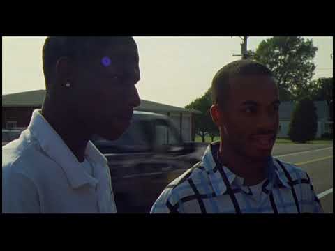 Close view of The Roots performing live with MCs trading verses at Block Party