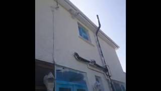 Spraying Pebble Dashing and then Rolling out to Finish it