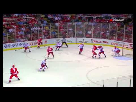 Pavel Datsyuk gives Gustav Nyquist a push on the rush March 19 2012
