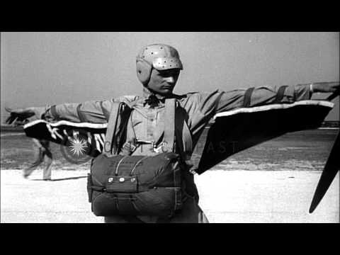 Views of Jacqueline Cochran flying an airplane and other aircraft in flight. HD Stock Footage