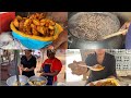STREET FOOD IN GHANA| COOKING BEANS AND GARI IN THE STREET OF ACCRA GHANA