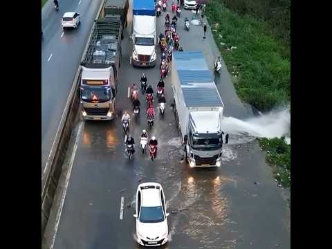 Not All Heroes Wear Capes. Some Drive Trucks 🚚💦 #RealHero #YouTubeShorts #RoadSafety