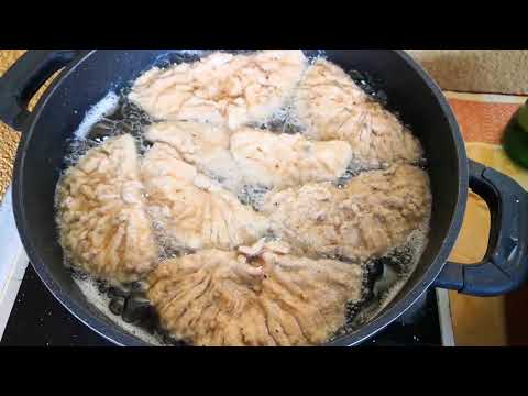 Steinpilze und Parasol backen in der Pfanne