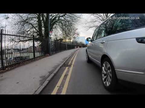 Extremely Close Pass by a Range Rover Driver
