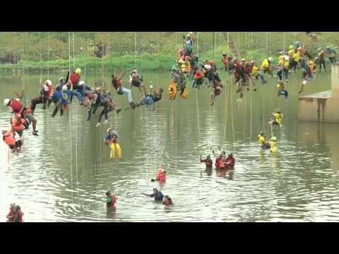 Watch: 245 Thrill-seekers jump off a bridge in Brazil for world record