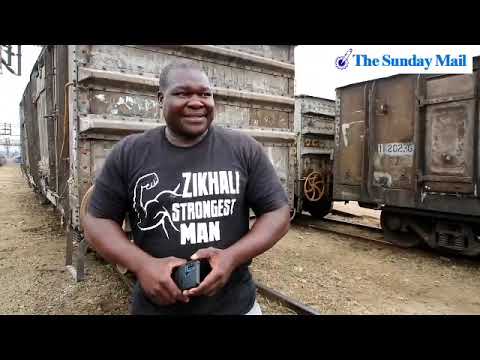 Zimbabwean strongman Arnold Zikhali pulls 56-tonne train wagon.