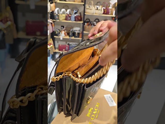 حقيبة كوتش لماع أبيض تابي