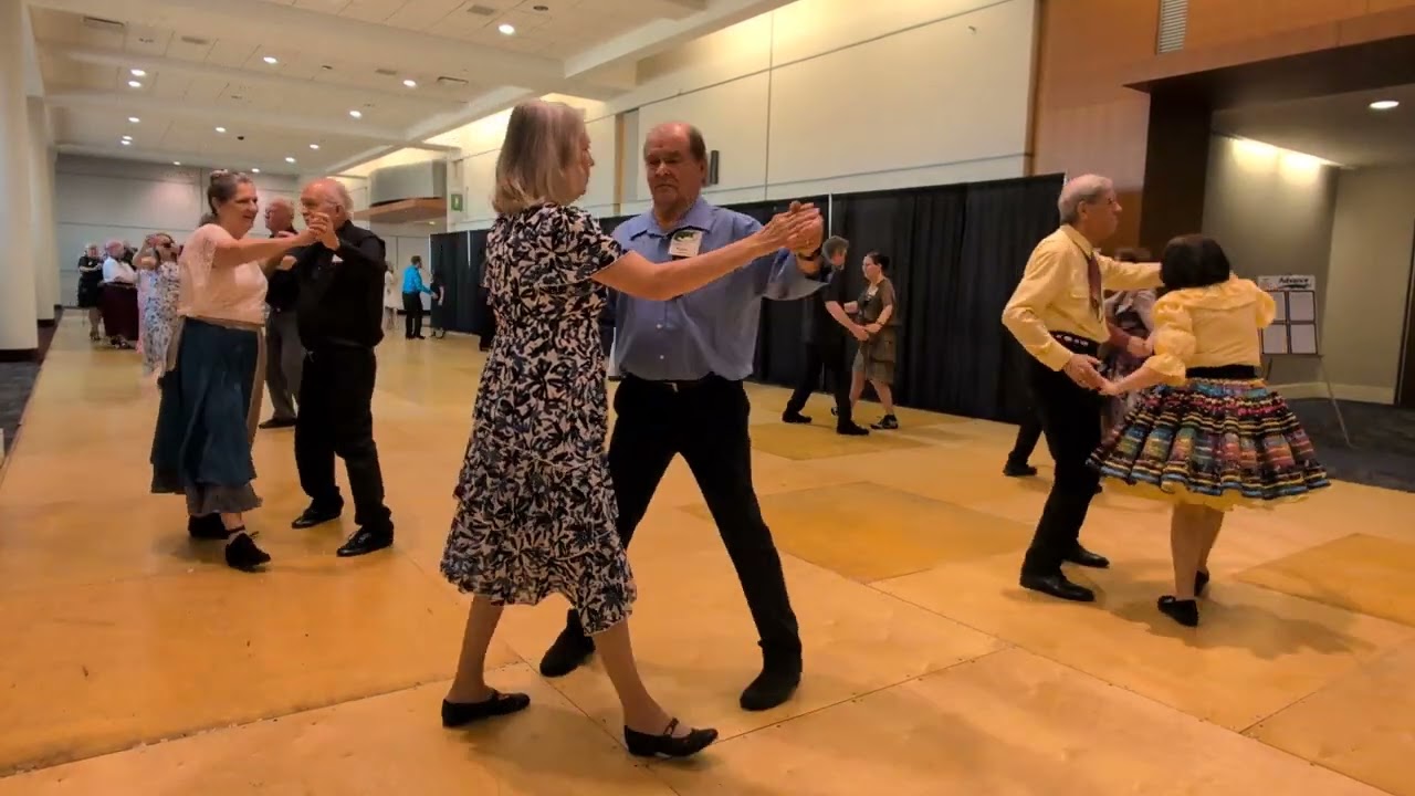 Round dancing with Carolyn Ahart cueing at the National Square Dance Convention in Shreveport, LA.