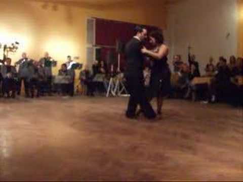  Vilma Fabiana Vega  and  Fernando Galera  are  dancing  to  the  tango  "  El Huracan  "