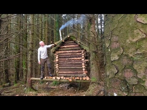 tiny log cabin build , tree house log cabin hand tools only