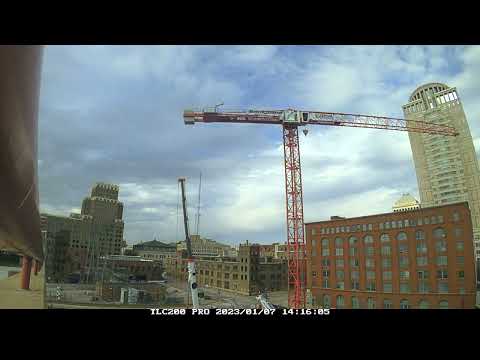 360 ton mobile crane assembles a tower crane for new luxury apartment complex in St. Louis