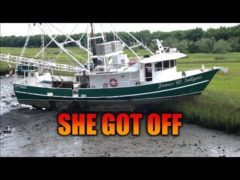 Shrimp Boat is clear of the mudbank and now being repaired