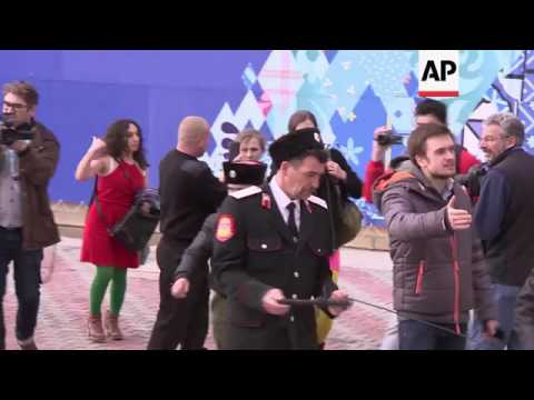 Pussy Riot and their supporters attacked by Cossack militia CONTAINS PROFANITIES