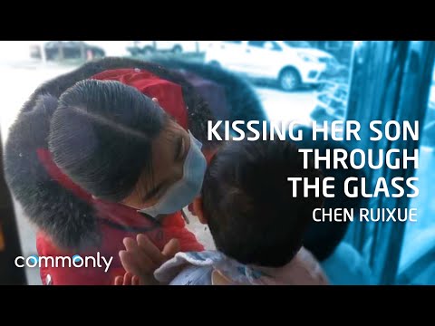 Kissing Her Son Through The Glass