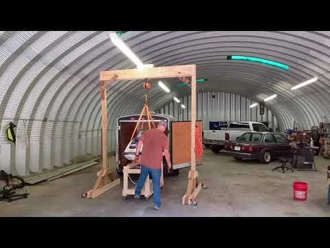 Demonstrating the $300 DIY Wooden Gantry Crane: Affordable Lifting Power!