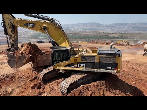 Caterpillar 385C Excavators Working On Huge Mining Sites - Mega Machines  Movie