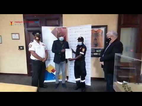 Firefighter Richard Mbeyiya receives Commendation Award after saving a puppy stuck in a storm drain
