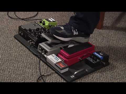 Michael Landau shows his pedalboard around 2007