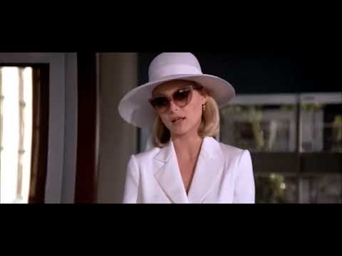 Scarface trailer frame — Tony Montana ascends Miami’s neon ladder while Moroder’s synths prowl