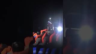 The panicking men risk sinking the boat so he screams for silence