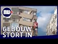 Metershoog flatgebouw stort in na aardbeving in Izmir | NU.nl