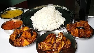 baked chicken wings eating with rice and cold drink
