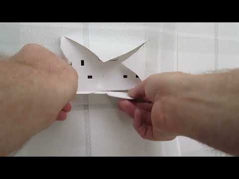 Learn how to hang wallpaper around a wall socket like a pro !