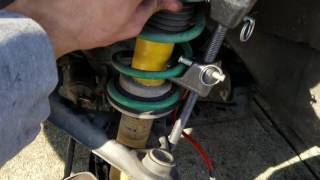 How to change 1999 miata front shock suspension strut