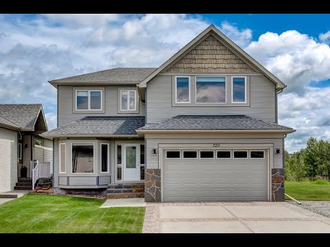 Calgary Real Estate Property Video Tour Production - 320 Crawford Close, Cochrane