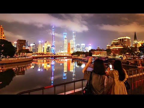 Paisagem noturna de Xangai: passeio a pé do Bund até a ponte rodoviária Zhapu