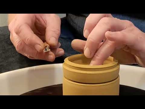Throwing and trimming a small closed form lidded jar