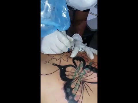 tiquim tattoo