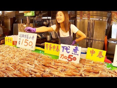 Mercado de peixe fresco no porto de pesca de Nanliao, mercado de peixe de Taiwan