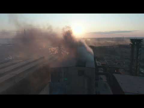 aerial view high chimney pipe with grey smoke co 2021 08 26 20 04 24 utc