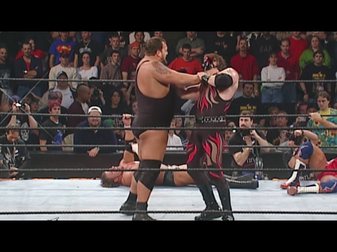 Kane shows off his immense strength by lifting Big Show over-the-top-rope: Royal Rumble 2002