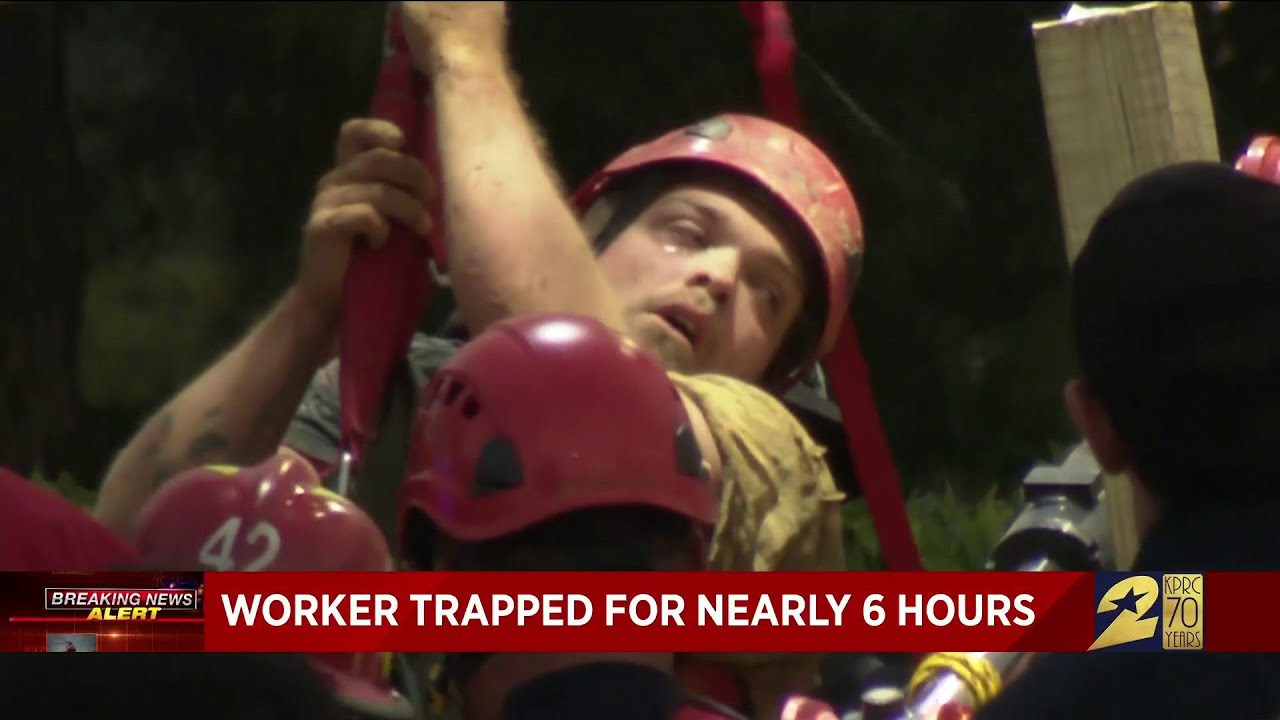 Worker trapped for nearly 6 hours