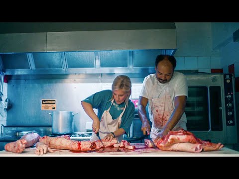 A couple discovers that human flesh tastes much better and begins killing and selling people.