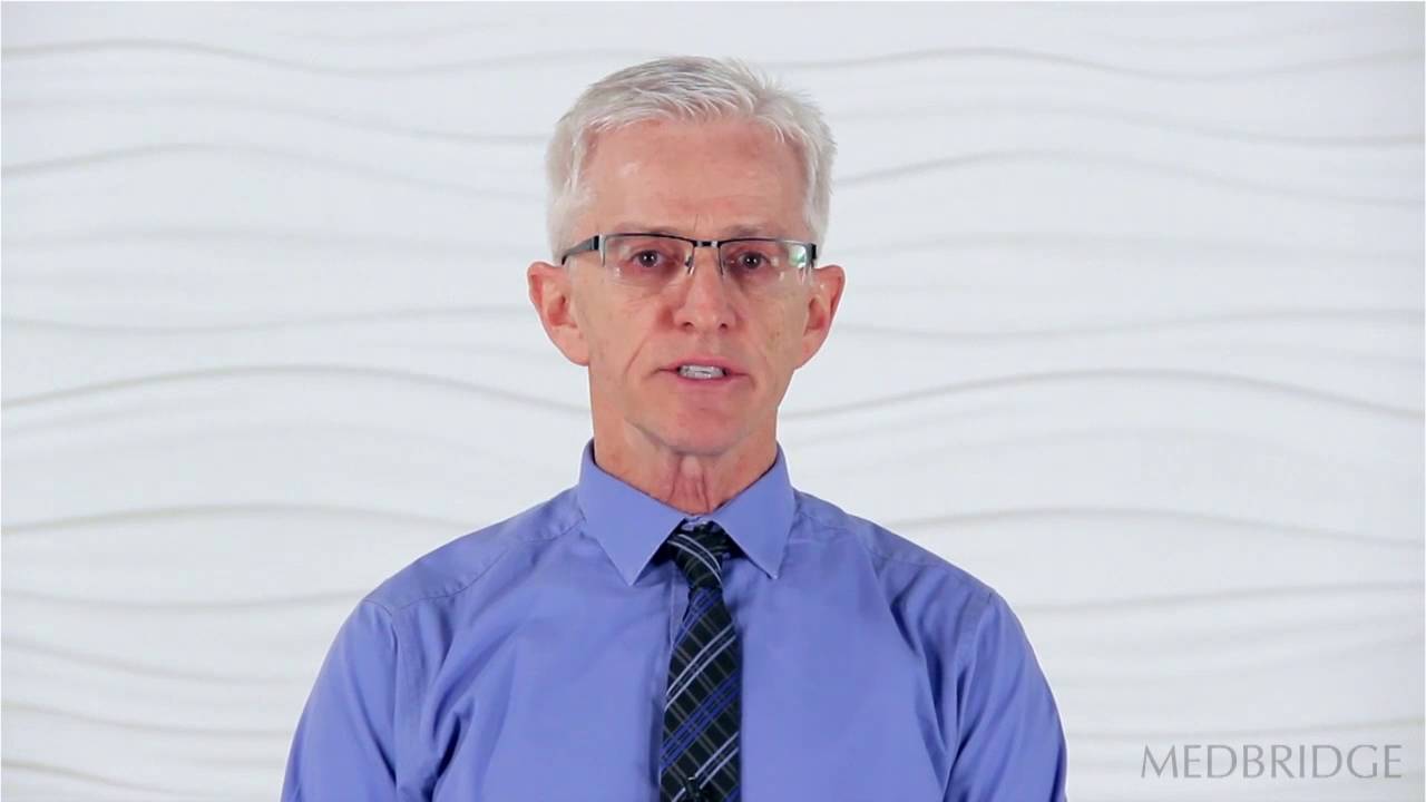 A confident older adult in glasses and a purple shirt represents the future of hybrid care for Medbridge.