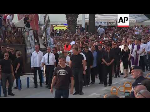 Croatia bids farewell to singer Dragojevic; body departs for burial by boat