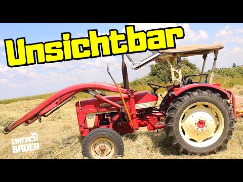 Farmer makes hay - The tractor that disappears