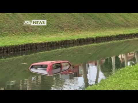AUTO NEL CANALE, SI TUFFANO PER SALVARE UNA DONNA