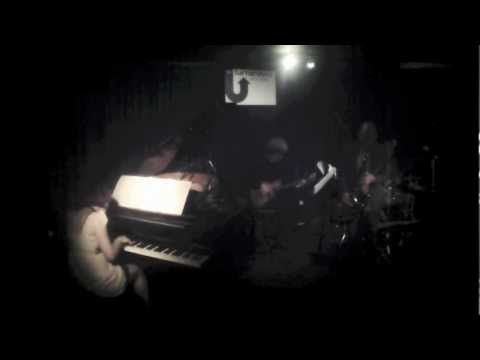 Andrew Butt Trio + (1) performing The Alligator Escalator