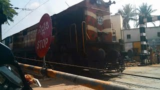 preview picture of video 'Cruising Yesvantpur Garibrath Thunders the Level Crossing'